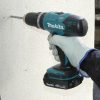 Makita Akku-Schlagbohrschrauber DHP453RFX2 18 V / 3,0 Ah im Alukoffer inklusiv 96-teilig Zubehörset